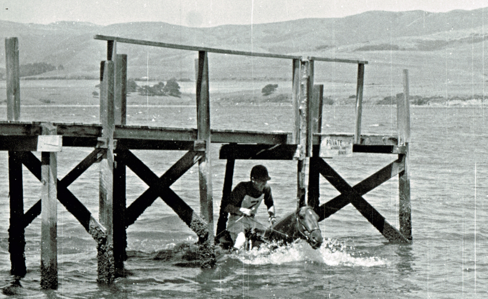 Ernest Simard II on Paddy Boals negotiate a cross-country obstacle at the Inverness Two-Day Event in California in 1962. Tony Vacek Photo