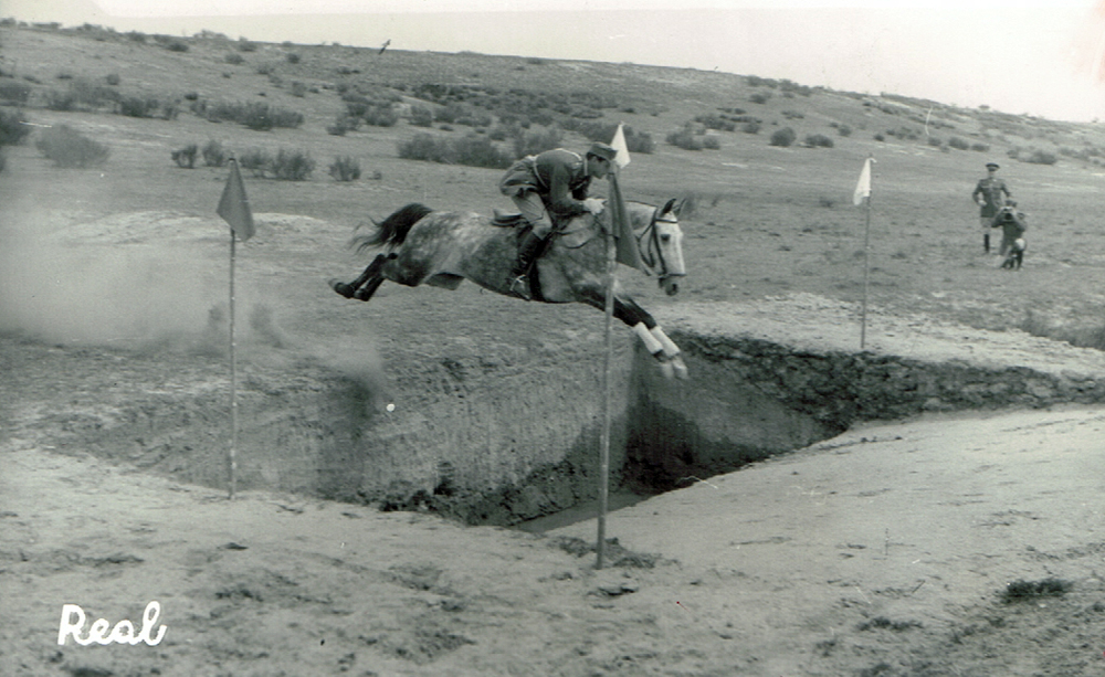 A Spanish Riding School student jumps a ditch that was part of the final three-day event exam for second-year students. 